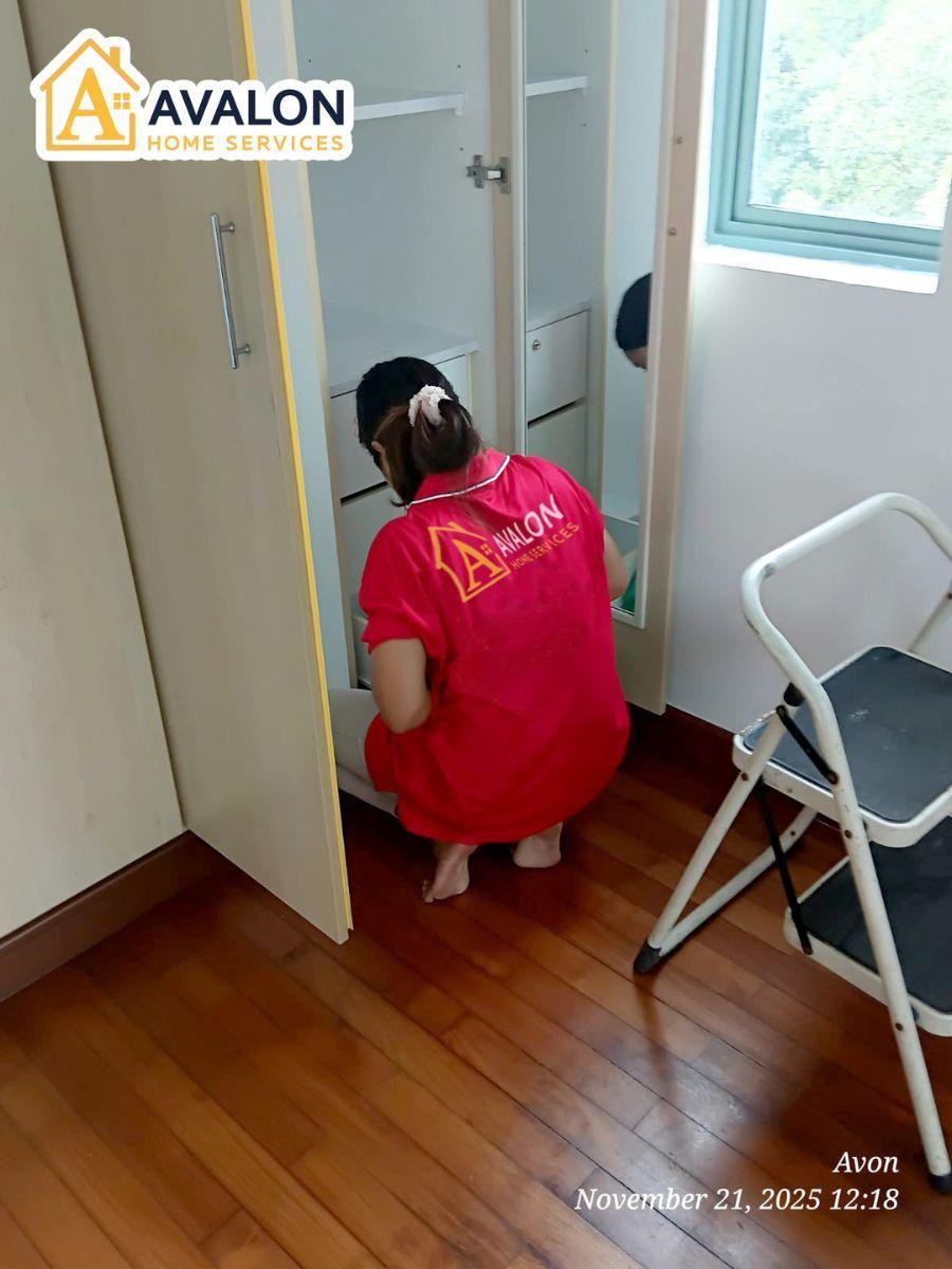 part-time maid cleans wardrobe